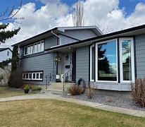 Image result for Changing a 90s Tudor to Horizontal and Vertical Siding