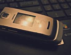 Image result for Square Flip Phone with Full Keyboard