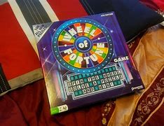 Image result for Wheel of Fortune Board Game