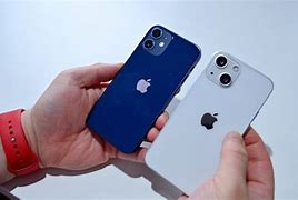 Image result for iPhone 13 Actual Size in Human Hand