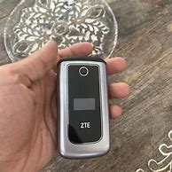 Image result for ZTE 233 Cymbal Flip Phone