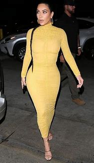 Image result for Kim Kardashian Black Empire Waist Dress