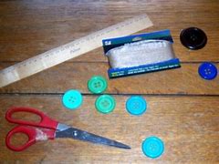 Image result for Button On a String Toy