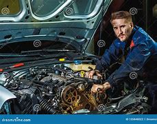 Image result for Engineer Fixing a Car