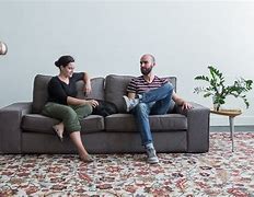 Image result for Photo of 2 People Sitting On Sofa