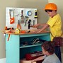 Image result for Garage Storage Cabinets Hidden Work Table