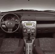 Image result for Mazda 2 Interior 2003