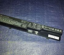 Image result for Dell Laptop Battery Swollen