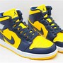 Image result for Air Jordan 1 Navy Blue and Yellow