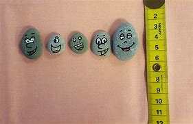 Image result for Pebble Painting Faces