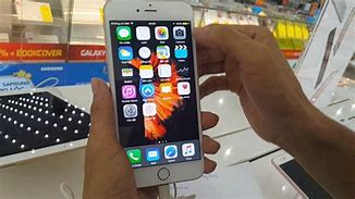 Image result for iPhone 6s Plus in Hand