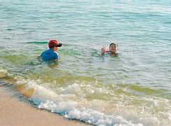 Image result for Kids Swimming in Ocean