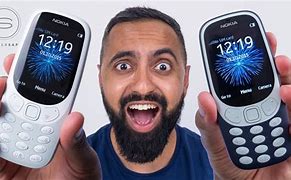 Image result for Symbols On a Nokia 3310 Mob