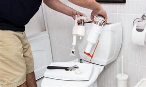 Image result for Fixing Toilet