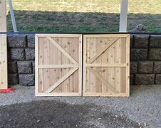 Image result for Outdoor TV Cabinet with Barn Doors
