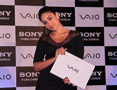 Image result for Woman Sony Viao Laptop On