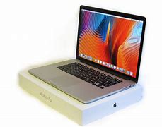 Image result for Apple On Top of Notebook