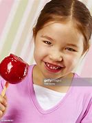 Image result for Child Eating Toffee Apple