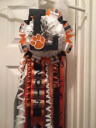 Image result for Orange Homecoming Mums