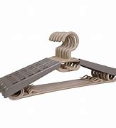 Image result for Wide Plastic Coat Hangers