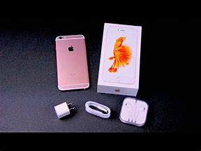 Image result for iPhone 6s Plus Rose Gold in Hands