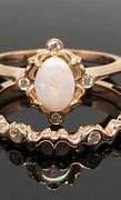 Image result for Rose Gold Opal Engagement Rings