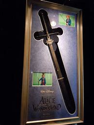 Image result for Alice in Wonderland Mad Hatter Cane Sword