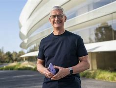 Image result for Tim Cook iPhone On Hand