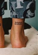 Image result for 2000 Tattoo Arm