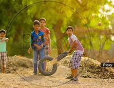 Image result for Barefoot Indian Kids Playing Cricket