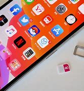 Image result for iPhone 11 Sim Card Hole