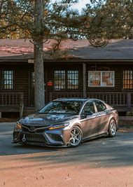 Image result for Lowered Camry with Red Wheels