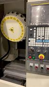 Image result for Fanuc Robot CNC Machine