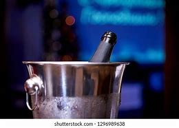 Image result for Open Bottle of Champagne On-Ice