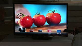 Image result for Black Wooden Magnavox TV