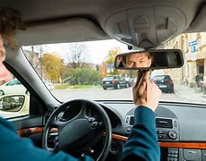 Image result for Holding Car Mirror