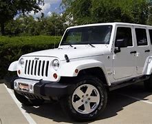 Image result for White 4 Door Jeep with Tan Top