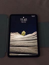 Image result for iPad 6 Mini Next to iPhone