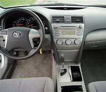 Image result for 2010 Toyota Camry SE Red Black Interior