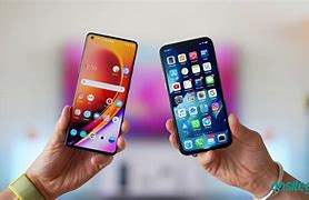 Image result for Apple and Andriod Phone Stock Image
