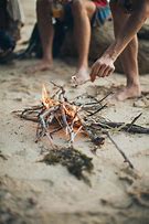 Image result for People Walking with a Stick On Fire