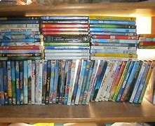 Image result for DVD Collection Either Side of My TV Unit