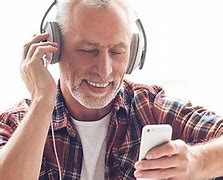 Image result for Older Person Listening to Podcast