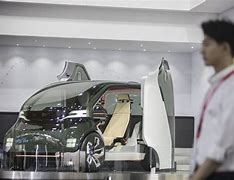 Image result for Newsom Electric Car in Shanghai China