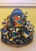 Image result for Donald Duck through the Years Snow Globe