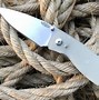 Image result for Small Clipless Pocket Knife