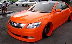 Image result for Toyota Camry Orange
