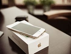 Image result for iPhone 5S in Hand