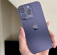 Image result for iPhone 14 Pro Black in Hand