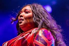 Image result for Lizzo Twerking Playing the Flute